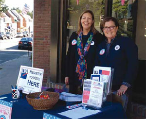 Co-Presidents Jennifer Mebes Flagg and Sheila Bernson register voters in downtown Chappaqua during National Voter Registration Day.