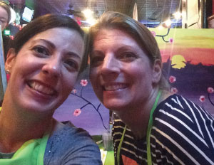 Heather Brill and Nicole Meyer share friendship and fun at a previous Paint Nite event.