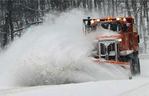 One truck and driver from the intrepid snowplow force, out clearing roads during the early morning hours in Armonk last winter.