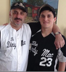 Dan and his son, Greeley senior, Charlie, sport their team colors.