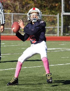 Carter Salore Quarterback #5, who started all 11 games at quarterback, helped lead the Armonk Warriors to the playoffs with an 8-3 record. Photo by Shari Fruhling