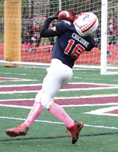 Wide receiver Bobby Chicoine #16 on the receiving end of a 30 yard touchdown pass. Photo by Shari Fruhling