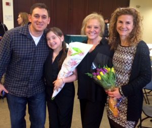 Isabella with her parents, Matt & Amy Yallof, and her JID teacher, Shari Applebaum