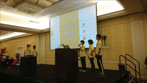 All five team members on stage for the formal presentation. Leslie Shih Photo