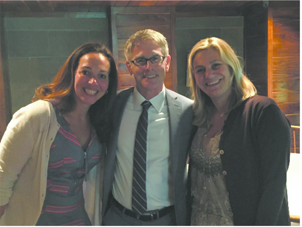 Abby Woodworth (L), the incoming president, Dr. Donohue and Lara Stan- gel share a moment at the BHPTSA Spring Luncheon honoring retirees as well as the outgoing and incoming executive board.
