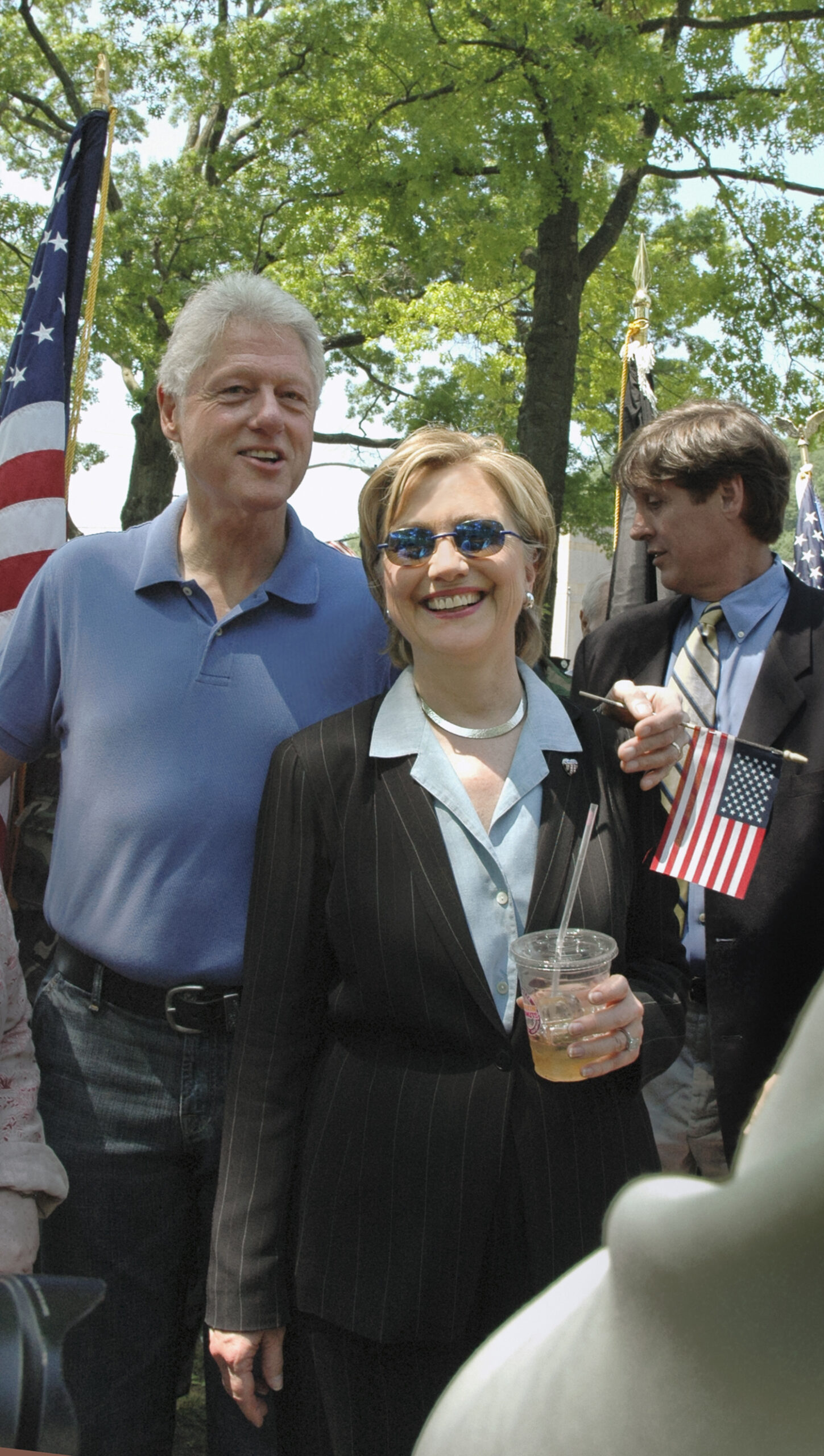 - “A Casual Moment/Memorial Day 2006” by Marianne Campolongo Photography. The Clintons relax after the 2006 Memorial Day parade in Chappaqua, NY. This photograph will be displayed in the exhibition’s “Celebrity Neighbors” section.