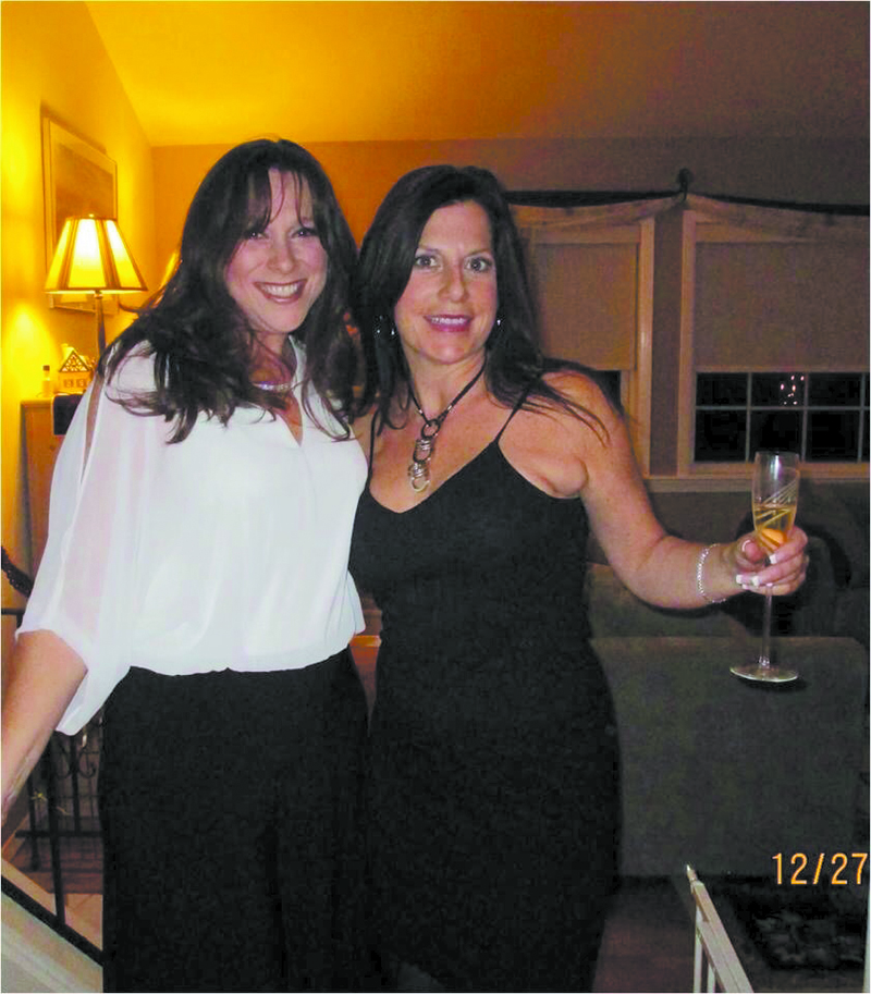 Grown-up time! Our author (right) takes time away from kids to co-host an annual holiday party with Jennifer Cahill.