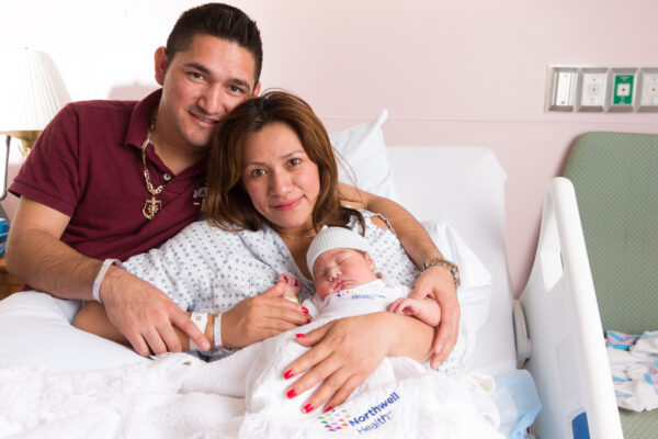 Nelson Bautista, Marinel Barcilai Garcia and newborn Nelson Garcia, New Year's Day, Northwell Health/Northern Westchester Hospital, Mt. Kisco, NY. 01/01/2016 Photo by Steve Hockstein/HarvardStudio.com