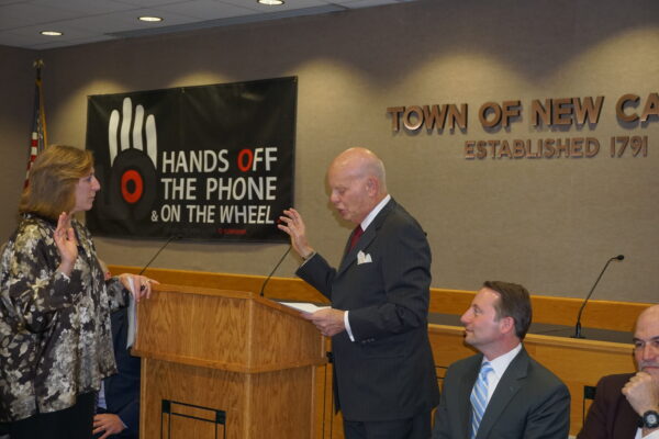 Former state Senator Steven Saland swearing in Hala Makowska as a town board member