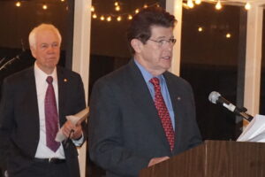Rotarian Edward Melvin presenting the award to the Chappaqua Garden Club