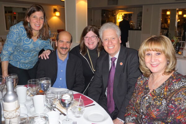 Ann Herrero (middle), Paul Harris Award recipient, with County Legislator Mike Kaplowitz (right) and his wife Jane, and friends.