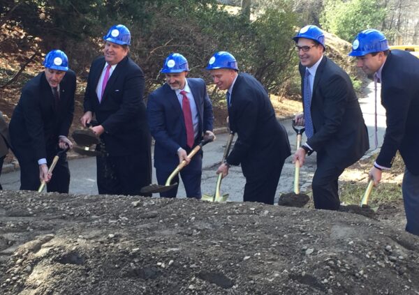 The groundbreaking official first dig. (L-R) Westchester Deputy County Executive Kevin Plunkett; Summit Development President Felix Charney; New Castle Town Supervisor Robert Greenstein; Westchester County Board of Legislators Chairman Michael Kaplowitz; Jeff Melby, Senior Vice President Life Time Real Estate and Development; Jake Grossman, co-President Grossman Companies. Photo by Matt Smith.