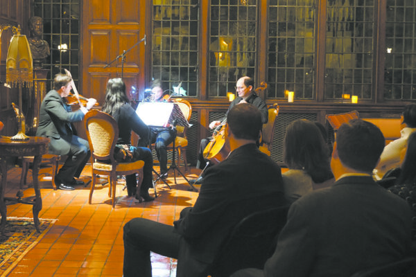 Chappaqua Orchestra members performing during a Winter fundraiser