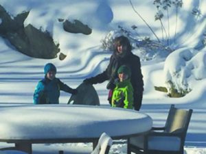 Barbara Winton enjoying the snow with the Saiontz boys.