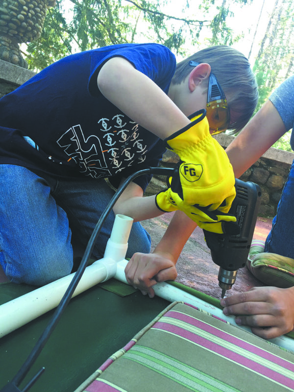 Cub Scout Rocky learns how to use power tools properly.