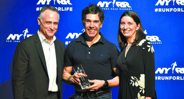 Danny Tateo (center) receiving New York Runner of the Year Award with wife, Elena (right), by his side.