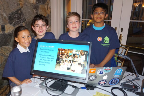 (L-R) Mia Brown, Charlie Peterson, Teddy Meyer and Neel Roy at “The Maker Spaces project” table. Library media specialists Christine Eidem (Roaring Brook) and Alison Turner (West Orchard) explained that the space is “project based learning” with equipment and tools for kids to build something they designed to solve a problem; and that most importantly, “it’s safe place for them to make a mistake and try again after they analyze what works. It’s an outside of the box experience.”