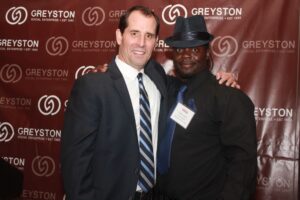 Mike Brady, President & CEO of Greyston with Greyston Bakery employee, Charles Jones
