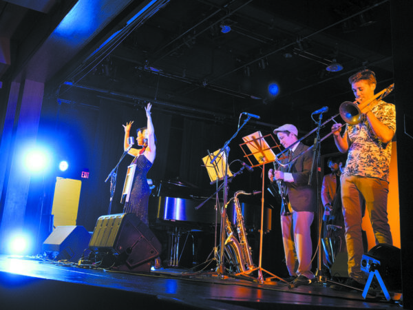 The Swingaroos perform at Whippoorwill Hall Theatre on July 9, 2016 as part of the Armonk Summer Concert series. Front row from left: Kimberly Hawkey (vocals), Dan Glaude (clarinet), Nat Ranson (trombone), Ray Cetta (upright bass) seen in rear. Marianne Campolongo Photo.