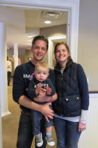 Brian Murray and his wife Erin and baby