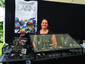 Armonk resident Lana Sidoti returned to the Armonk Outdoor Art Show for a fourth year to exhibit her bold and beautiful enameled jewelry and wall pieces, seen here on September 24, 2016. Photo © 2016 Marianne A. Campolongo.