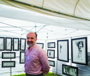 Long time Armonk Outdoor Art Show volunteer and Armonk resident Luis Perez showed his drawings for the first time at the Armonk Outdoor Art Show, on September 24, 2016. Photo © 2016 Marianne A. Campolongo.