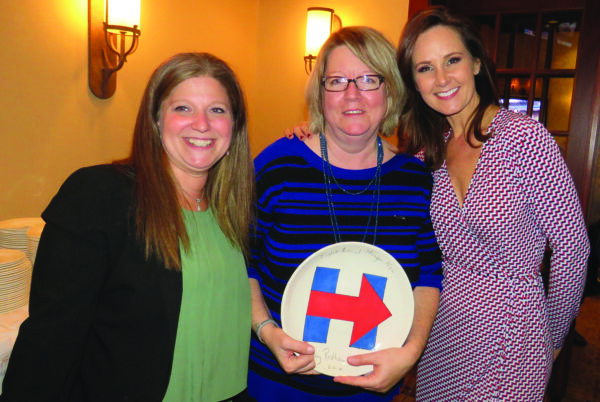 The signed Hillary Bowl: presented as a gift to Dawn Greenberg; here, together with Jessica Reinmann (left) and News 12 emcee, Lisa Salvadorini (right)