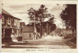 NYS Route 128 - Main Street, Armonk - early 1900s The building on the left survives today at the corner of Maple Avenue and Main Street. By the early 1900s the building was Lander Brothers Store and Post Office. The view is looking up NYS Route 128 - Main Street, Armonk, towards today's Bedford Road and Kent Place and farther up the hill towards NYS Route 22. Out of the image to the right, across from Lander Brothers Store and Post Office, would become today's Citibank.