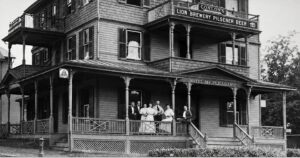 Conlon's on Wheeler Avenue was formally known as Mount Pleasant Hotel, but it was also known for its bar that served Lion Brewery Pilsner Beer. The staff poses on the porch.