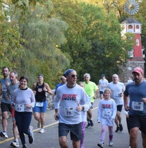 Stayin’ Alive participants crossing the bridge in Windmill